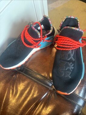 adidas Pharrell Williams Black Athletic Shoes with Red Laces and Teal Accents